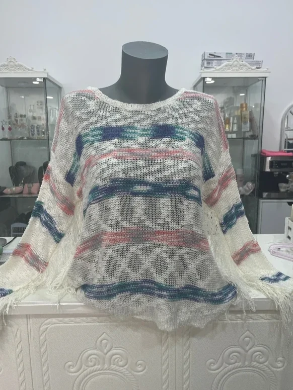 Jersey de punto fino con flecos y estampado geométrico