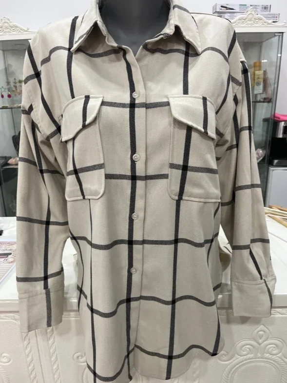 Camisa de cuadros beige y negra