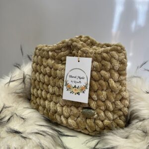 Bolso beige con textura acolchada