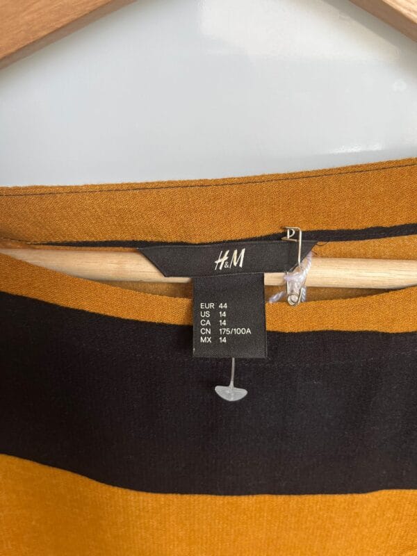 Blusa oversize rayas mostaza y negras H&M - Imagen 2
