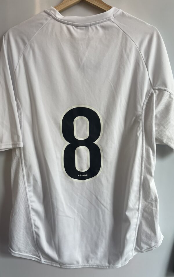 Camiseta deportiva blanca Kipsta con dorsal 8 - Imagen 5
